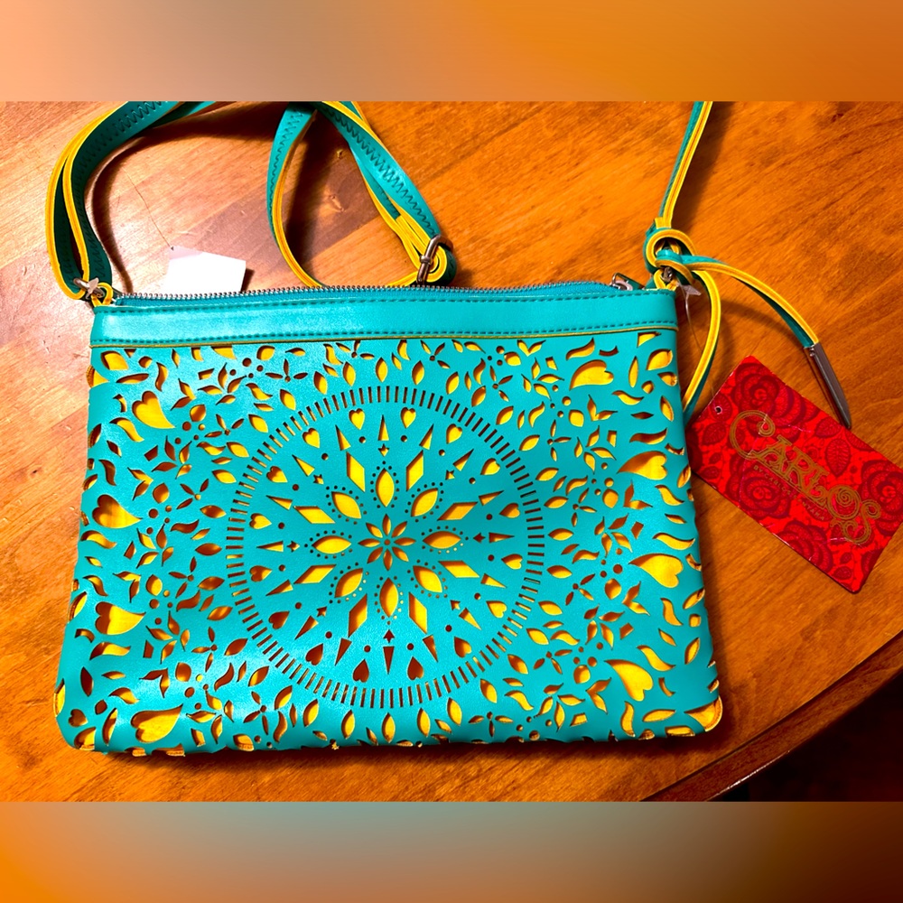 Carlos Santana turqoise and yellow hand bag
